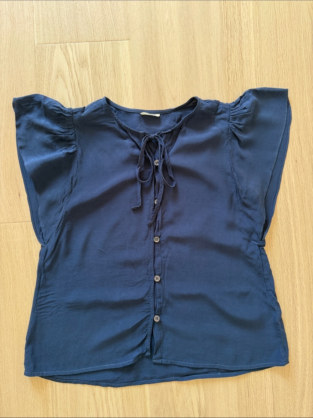 NAIF Navy Tie-Front Flutter Sleeve Blouse